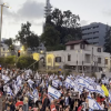 Israelis rally in Tel Aviv against government _ AFP 0-0 screenshot